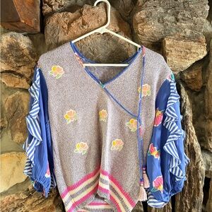 Floral Patterned Sweater with Blue Sleeves